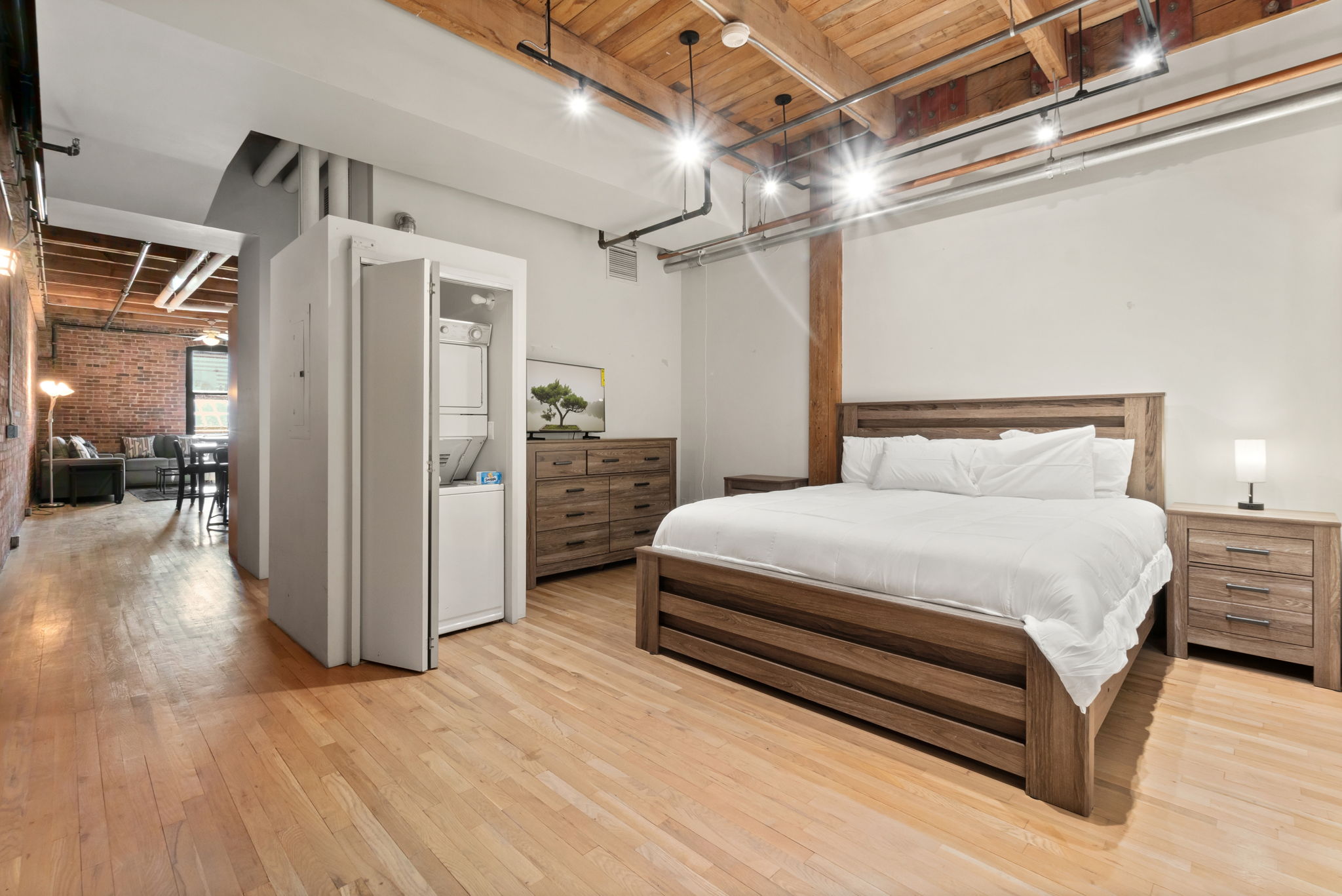 Fully Furnished Modern Loft in Historic Icehouse Building Steps from Union Station, Denver, CO

Discover urban living at its finest in this stunning fully furnished 1-bedroom, 1-bathroom loft in the iconic Icehouse Condominium Building, located in the heart of LoDo (Lower Downtown) Denver next to Union Station. This loft offers the perfect blend of industrial charm and modern comfort with exposed brick walls, wood-beamed ceilings, and a skylight.

The open-concept layout features a spacious living area with stylish furnishings, opening to the kitchen and dining areas and a large island — perfect for entertaining. The bedroom offers ample space, king sleep by number bed and a large walk-in closet, while the bathroom has a shower/tub.  This property also includes in-unit laundry, hardwood floors, and central HVAC.

The Icehouse Building offers top-notch amenities, including a rooftop deck with BBQ area, a fitness center, secure entry, and 1 assigned garage parking space in the rear of the building.

Situated just steps from Union Station, Coors Field, restaurants, breweries, and boutiques, this loft offers the ultimate walkable lifestyle. Whether you’re relocating or looking for a turnkey investment, this property is move-in ready and waiting for you.
