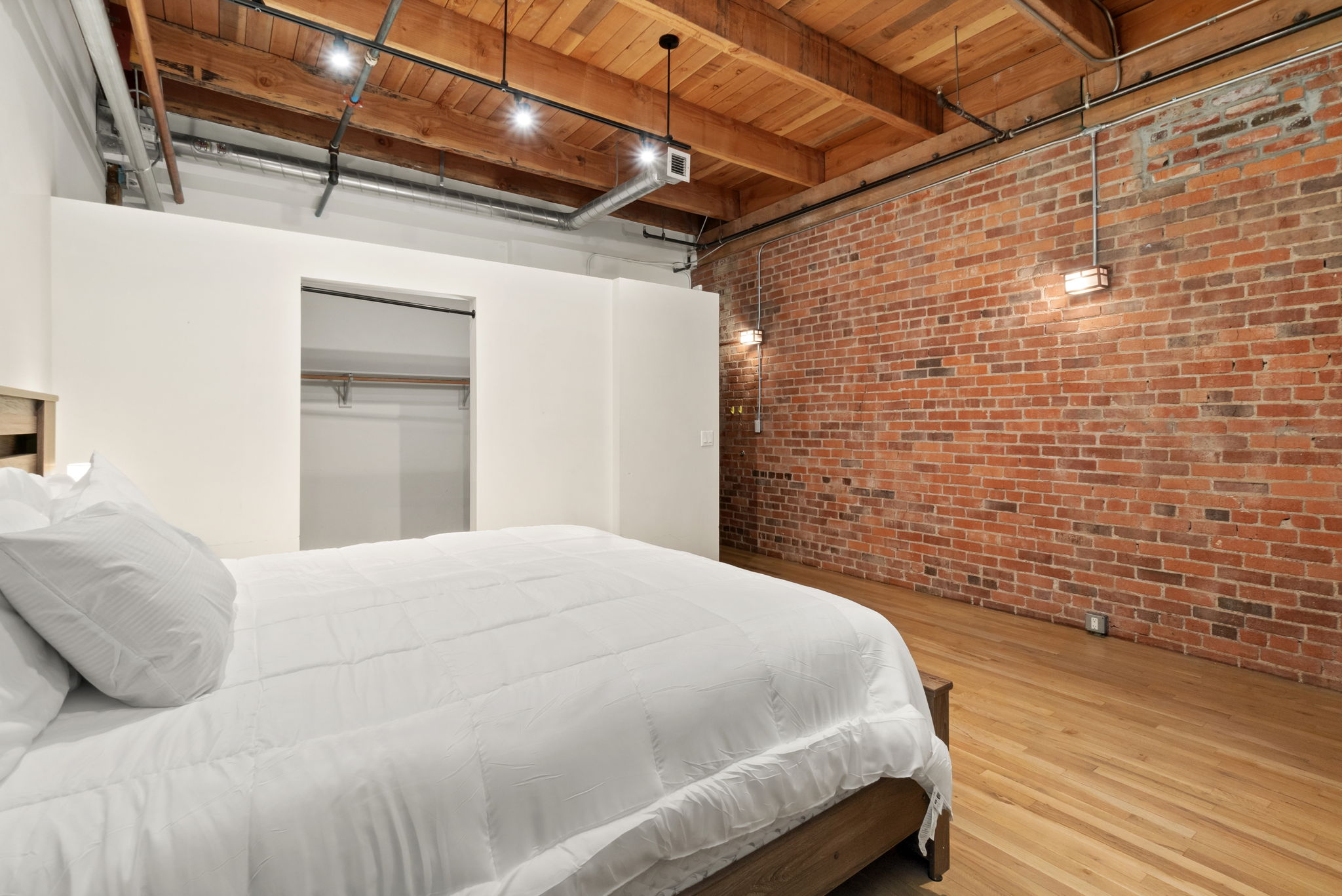 Fully Furnished Modern Loft in Historic Icehouse Building Steps from Union Station, Denver, CO

Discover urban living at its finest in this stunning fully furnished 1-bedroom, 1-bathroom loft in the iconic Icehouse Condominium Building, located in the heart of LoDo (Lower Downtown) Denver next to Union Station. This loft offers the perfect blend of industrial charm and modern comfort with exposed brick walls, wood-beamed ceilings, and a skylight.

The open-concept layout features a spacious living area with stylish furnishings, opening to the kitchen and dining areas and a large island — perfect for entertaining. The bedroom offers ample space, king sleep by number bed and a large walk-in closet, while the bathroom has a shower/tub.  This property also includes in-unit laundry, hardwood floors, and central HVAC.

The Icehouse Building offers top-notch amenities, including a rooftop deck with BBQ area, a fitness center, secure entry, and 1 assigned garage parking space in the rear of the building.

Situated just steps from Union Station, Coors Field, restaurants, breweries, and boutiques, this loft offers the ultimate walkable lifestyle. Whether you’re relocating or looking for a turnkey investment, this property is move-in ready and waiting for you.
