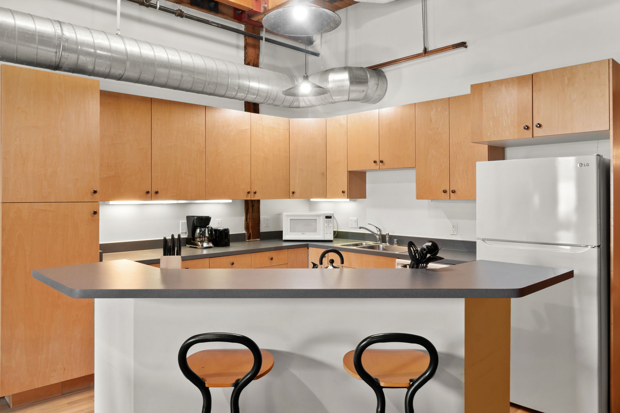 Fully Furnished Modern Loft in Historic Icehouse Building Steps from Union Station, Denver, CO

Discover urban living at its finest in this stunning fully furnished 1-bedroom, 1-bathroom loft in the iconic Icehouse Condominium Building, located in the heart of LoDo (Lower Downtown) Denver next to Union Station. This loft offers the perfect blend of industrial charm and modern comfort with exposed brick walls, wood-beamed ceilings, and a skylight.

The open-concept layout features a spacious living area with stylish furnishings, opening to the kitchen and dining areas and a large island — perfect for entertaining. The bedroom offers ample space, king sleep by number bed and a large walk-in closet, while the bathroom has a shower/tub.  This property also includes in-unit laundry, hardwood floors, and central HVAC.

The Icehouse Building offers top-notch amenities, including a rooftop deck with BBQ area, a fitness center, secure entry, and 1 assigned garage parking space in the rear of the building.

Situated just steps from Union Station, Coors Field, restaurants, breweries, and boutiques, this loft offers the ultimate walkable lifestyle. Whether you’re relocating or looking for a turnkey investment, this property is move-in ready and waiting for you.
